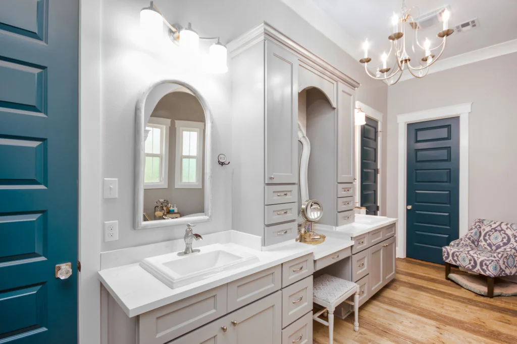 Completed bathroom cabinetry with double vanity