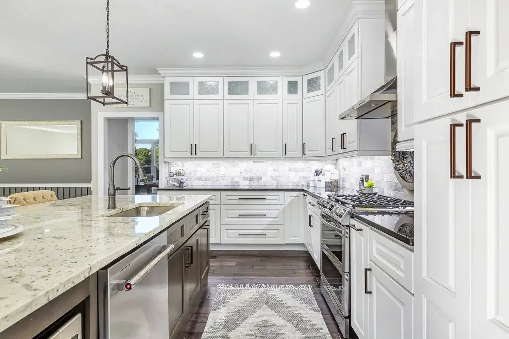 Completed white kitchen cabinetry